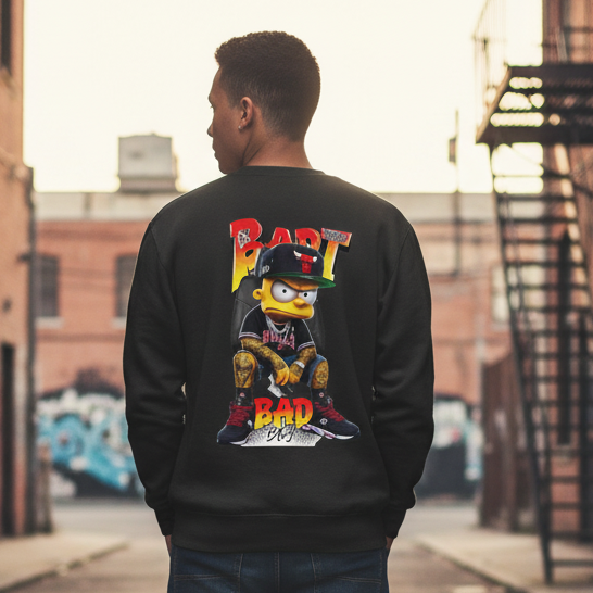 Person wearing a black sweatshirt with colorful graphics in an urban alleyway.